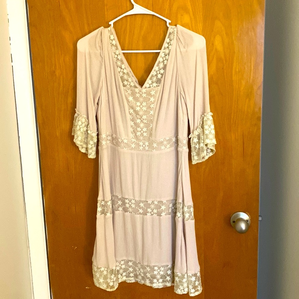 Blush pink mid length dress.